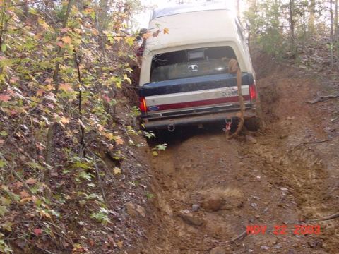 1989 Ford Bronco - 1989 Ford Bronco struggling on a difficult off-road trail.