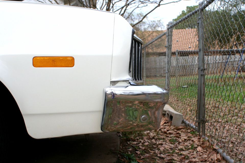 1976 Ford Ranchero rear quarter panel with amber marker light and chrome bumper