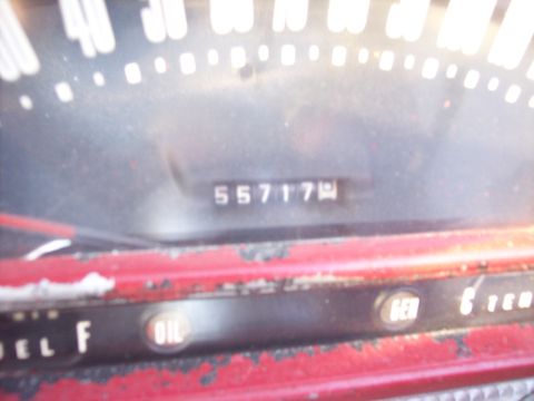 1956 Ford Thunderbird - The odometer shows 55,717 miles on this vintage vehicle's dashboard.