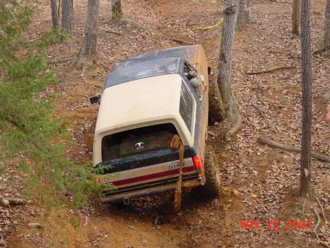 1989 Ford Bronco - This 1980s Ford Bronco navigates a challenging off-road course.