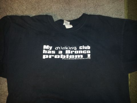 1986 Ford Bronco - A t-shirt displays a humorous message about having a 'Bronco problem'.