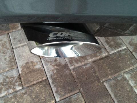 2013 Ford Mustang - Close-up of a chrome exhaust tip the CORSA PERFORMANCE EXHAUST branding.
