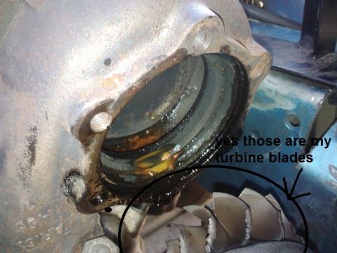 1995 Ford Probe - The turbine blades of this turbocharger are visibly damaged.