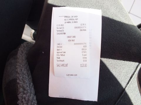2003 Ford Crown Victoria - Photo of a printed credit-card sale receipt from Imperial Car Wash for a $120.00 transaction, not a technical document.