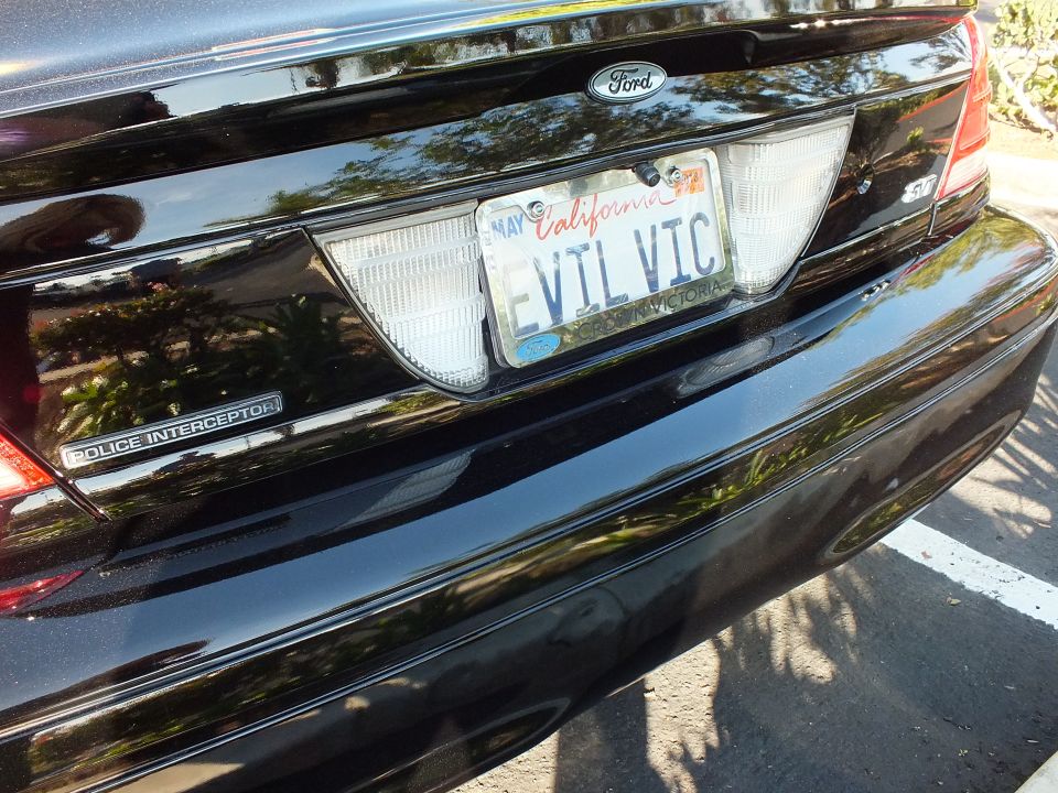 Ford Crown Victoria rear bumper with Police Interceptor badge and California EVIL VIC plate