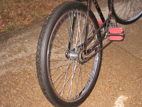 1994 Ford Bronco - The rear wheel, chain, and pedals of a bicycle are shown in this close-up shot.