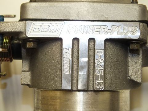 2003 Ford Crown Victoria - Macro of a BBK Power-Plus throttle body stamped 75mm and D-245-13 on the machined aluminum casting.