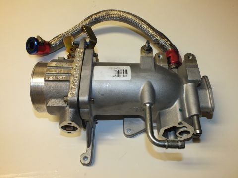 2003 Ford Crown Victoria - cast-aluminum intake plenum assembly with attached throttle body, braided lines and anodized fittings rests on a white surface.