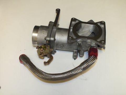 2003 Ford Crown Victoria - throttle body joined to a flanged aluminum intake adapter, with a braided hose curving below it.