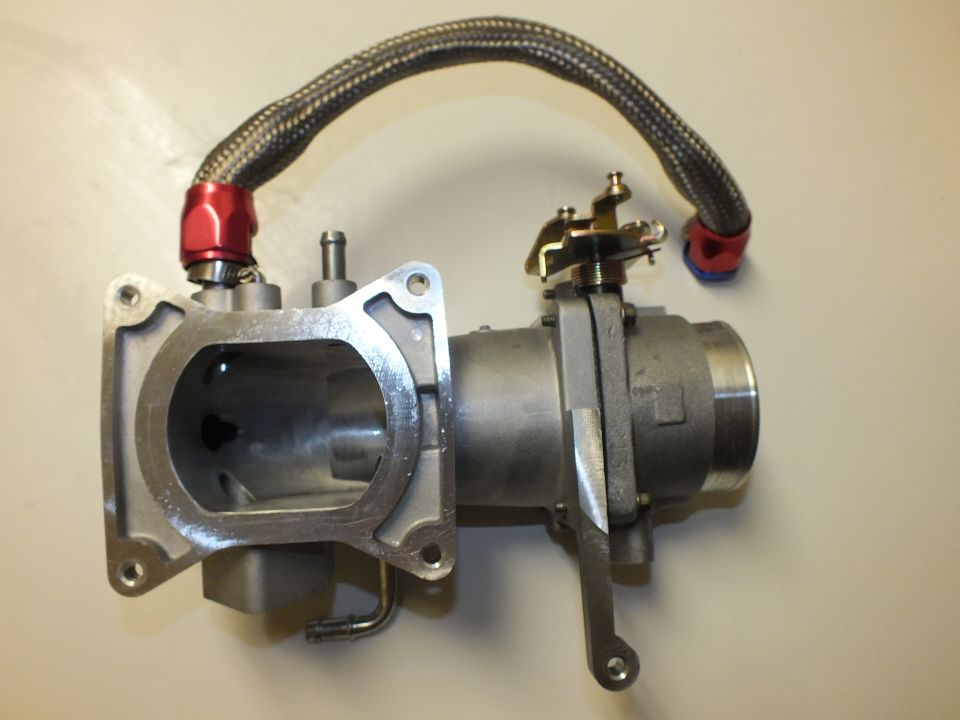 Aluminum intake elbow with rectangular flange port and braided line