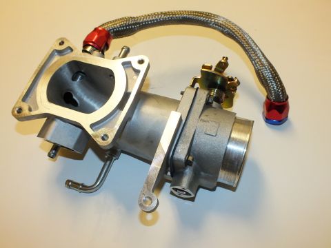 2003 Ford Crown Victoria - throttle body bolted to a flanged aluminum intake elbow, with a braided hose ending in red and blue fittings.