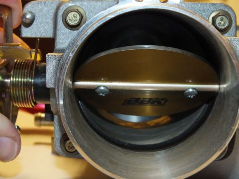 2003 Ford Crown Victoria - Brass throttle blade stamped BBK seated in an aluminum bore, held by two screws on the central shaft