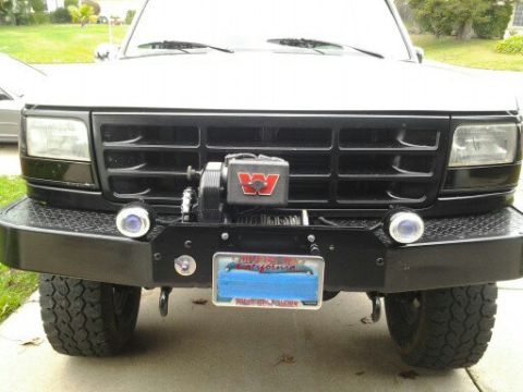 1996 Ford Bronco - 1992 Ford Bronco front end shows aftermarket bumper and winch.
