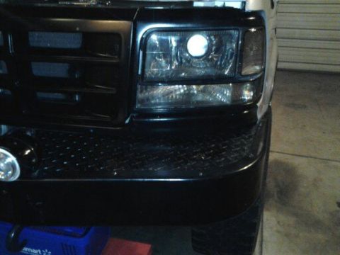 1996 Ford Bronco - Front view of a 1996 Ford Bronco, its black grille and headlight assembly.