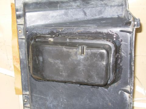1983 Ford Bronco - This HVAC vacuum reservoir was siliconed onto the evaporator cover (NOT factory), and leaking. So I removed it, wire-wheeled all the silico…