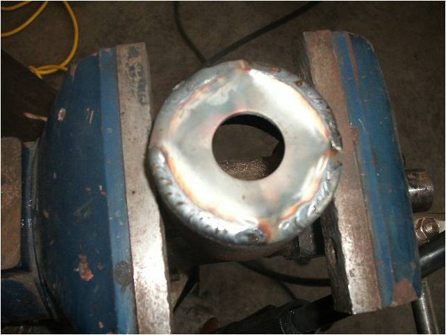 MAKING THE 2" BODY LIFT. 3/4" WASHERS AND 3/8" THICK STEEL PIPE