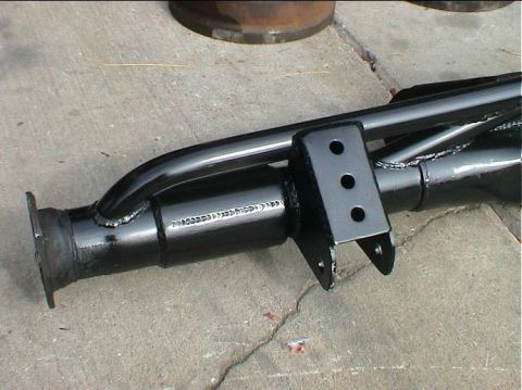 1979 Ford Bronco - Close-up view of a black painted rear axle housing, likely an aftermarket upgrade part.