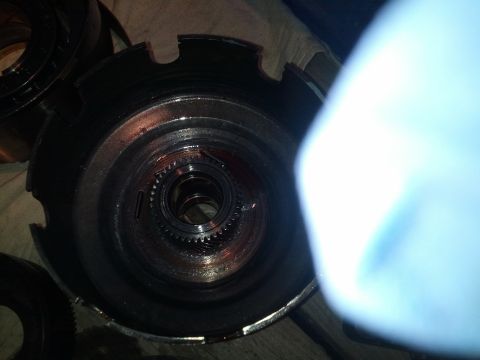 1995 Ford Bronco - This is a close-up view of a transmission part, possibly a clutch drum or torque converter component.