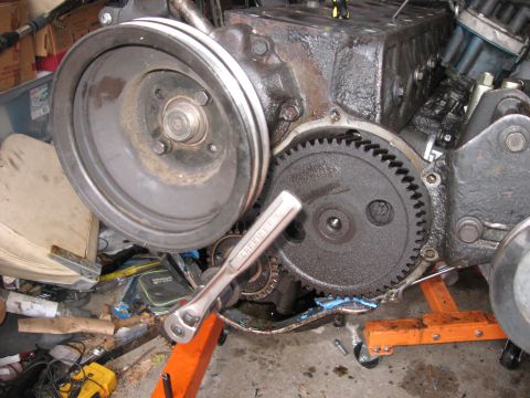 1981 Ford Bronco - Found an excellent technique for torquing down the flywheel and clutch. Put the water pump pulley on backwards and then put a wrench on the…