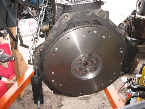 1981 Ford Bronco - New flywheel bolted down. The old one had massive cracks in it so it was no good.