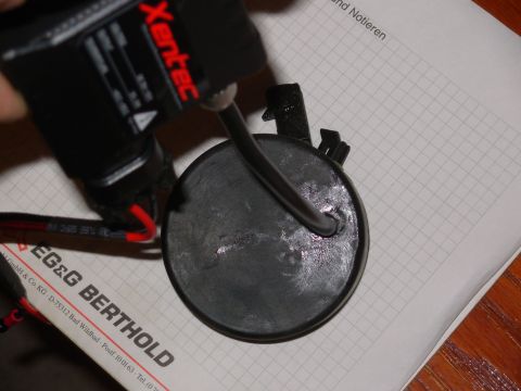 1983 Ford Bronco - A punched 1/4" hole is perfect to feed the HID wire through the bulb cap. It takes some effort & silicone grease, but the rubber will…