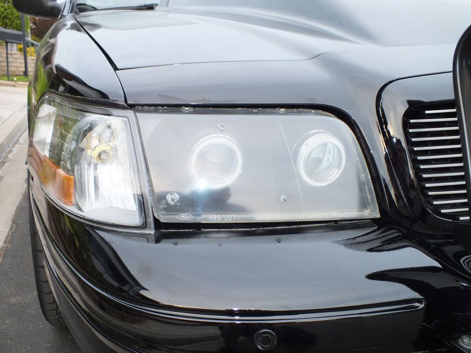 Crown Victoria front corner with halo headlight, amber marker and billet grille