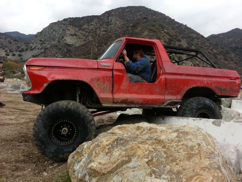 1978 Ford Bronco - This modified 1978 Ford Bronco is shown off-roading through a rocky canyon.
