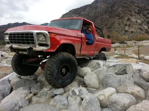 1978 Ford Bronco - This heavily modified 1978 Ford Bronco navigates a challenging rocky terrain.