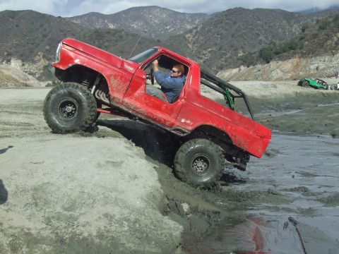 1978 Ford Bronco - This modified 1978 Ford Bronco is navigating a challenging off-road course.