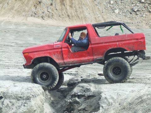 1978 Ford Bronco - This modified 1978 Ford Bronco is navigating a challenging off-road course.