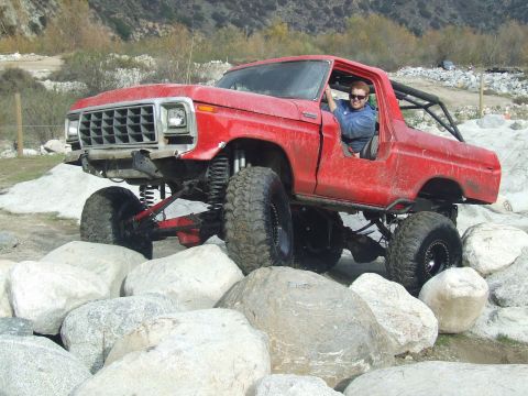 1978 Ford Bronco - This lifted 1978 Ford Bronco is shown off-roading through a rocky canyon.