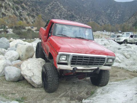 1978 Ford Bronco - This red 1978 Ford Bronco navigates a rocky terrain in Azusa Canyon.