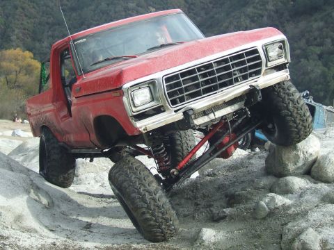 1978 Ford Bronco - Modified 1978 Ford Bronco navigating a rocky obstacle course.