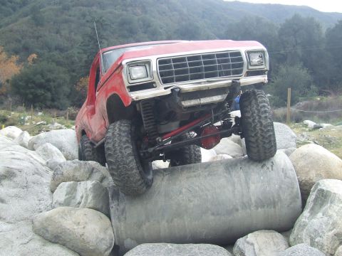 1978 Ford Bronco - This 1978 Ford Bronco navigates a challenging rocky terrain, demonstrating its off-road capabilities.