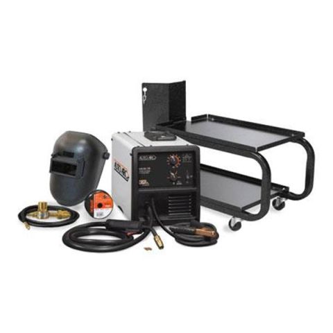 1976 Ford Bronco - Welding machine with accessories including a helmet, wire spool, and a two-tier cart.