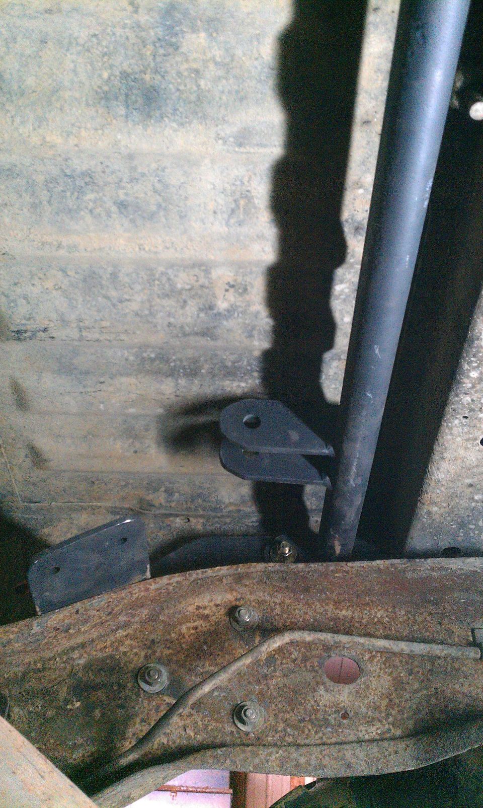 Rear shock hoop mount on rusty frame