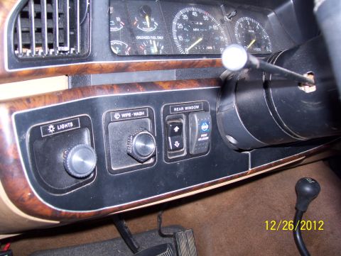 1990 Ford Bronco - Dashboard controls for lights, wipers, and rear window in a 1990 Ford Bronco.