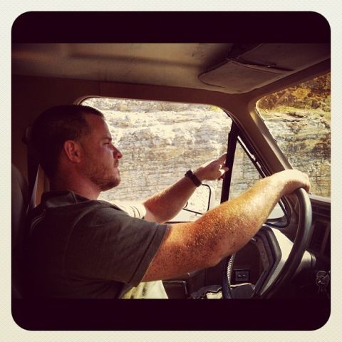 1986 Ford Bronco - Driver's perspective inside a 1986 Ford Bronco on a scenic drive.