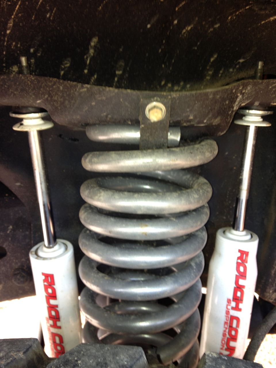 Front suspension coil spring and Rough Country shocks