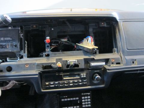1991 Ford LTD Crown Victoria - Dashboard interior of a 1991 Ford Crown Victoria LTD with the radio assembly removed.