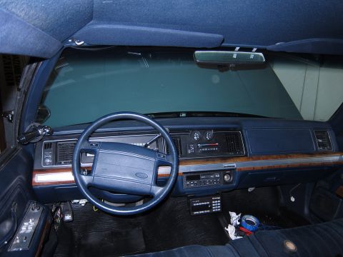 1991 Ford LTD Crown Victoria - Interior view of a 1991 Ford Crown Victoria LTD, showing the dashboard, steering wheel, and seating.