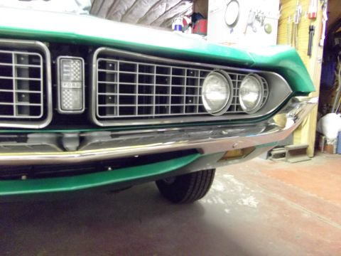 1971 Ford Ranchero - Close-up of the front grille and headlights on a 1970 Ford Ranchero.