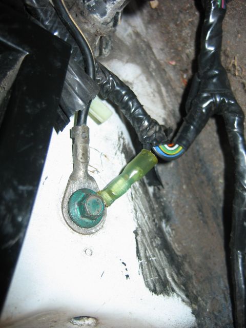 1992 Ford Bronco - ground behind drivers side kick panel just below hood release latch.