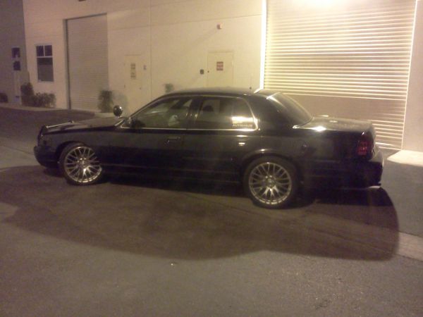 Black 2007 Ford Crown Victoria side view