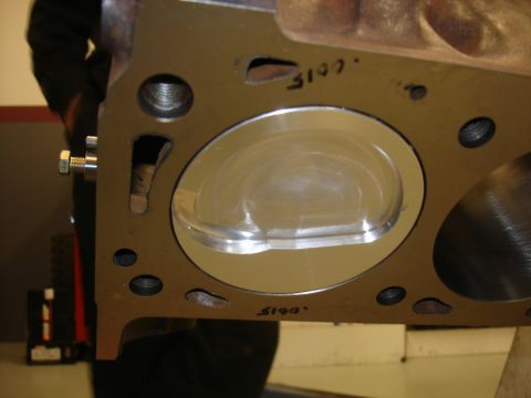 1988 Ford Mustang - Close-up of an engine cylinder head, showing a piston and cylinder bore with handwritten markings.
