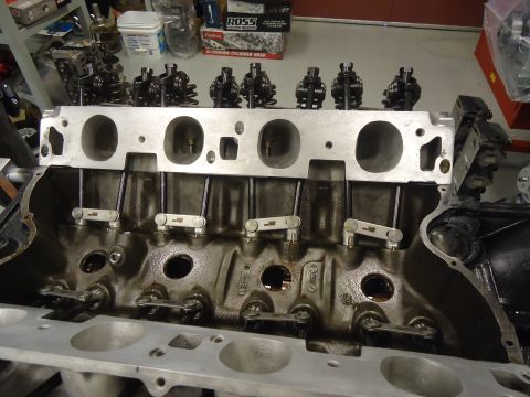 1988 Ford Mustang - Close-up of an engine block and cylinder head assembly, revealing internal components.
