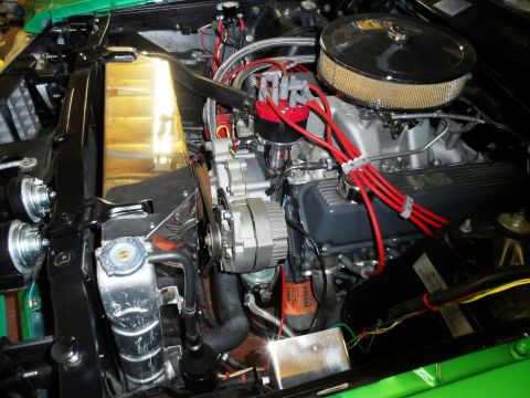 1971 Ford Ranchero - A detailed view of a car's engine compartment, highlighting the V8 engine and its components.