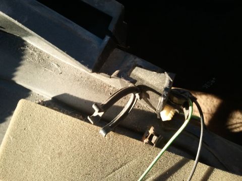 1994 Ford Bronco - Close-up view of a vehicle's dashboard wiring harness, showing connected wires.