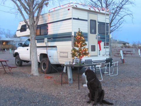 1997 Dodge 3500 - A 1994 Dodge Ram 3500 camper is parked outside with holiday decorations.
