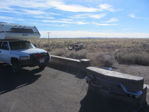 1997 Dodge 3500 - 1997 Dodge 3500 pickup with camper shell and a unique concrete bench.